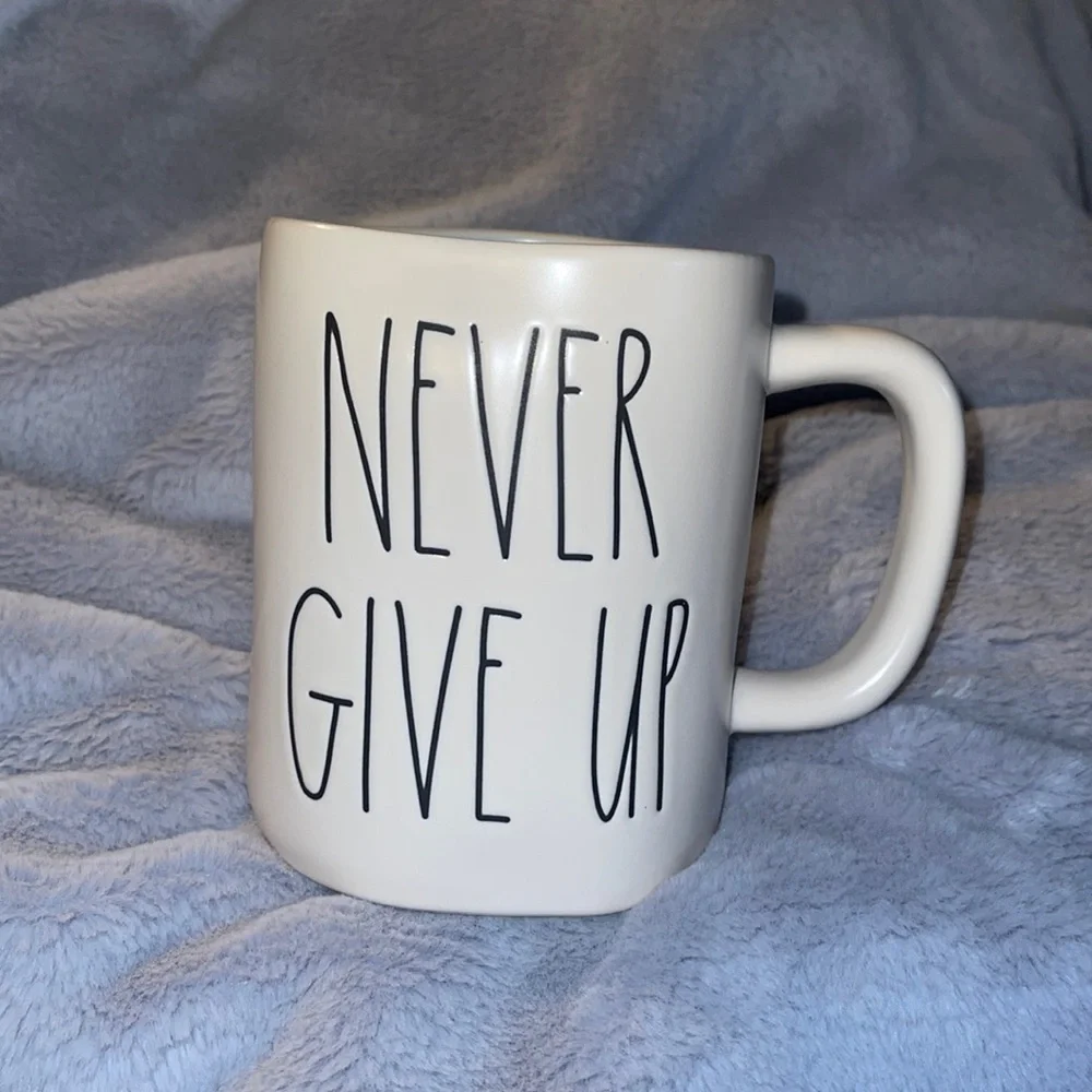Rae Dunn “Never Give Up” Blue & White Mug - Picture 1 of 3